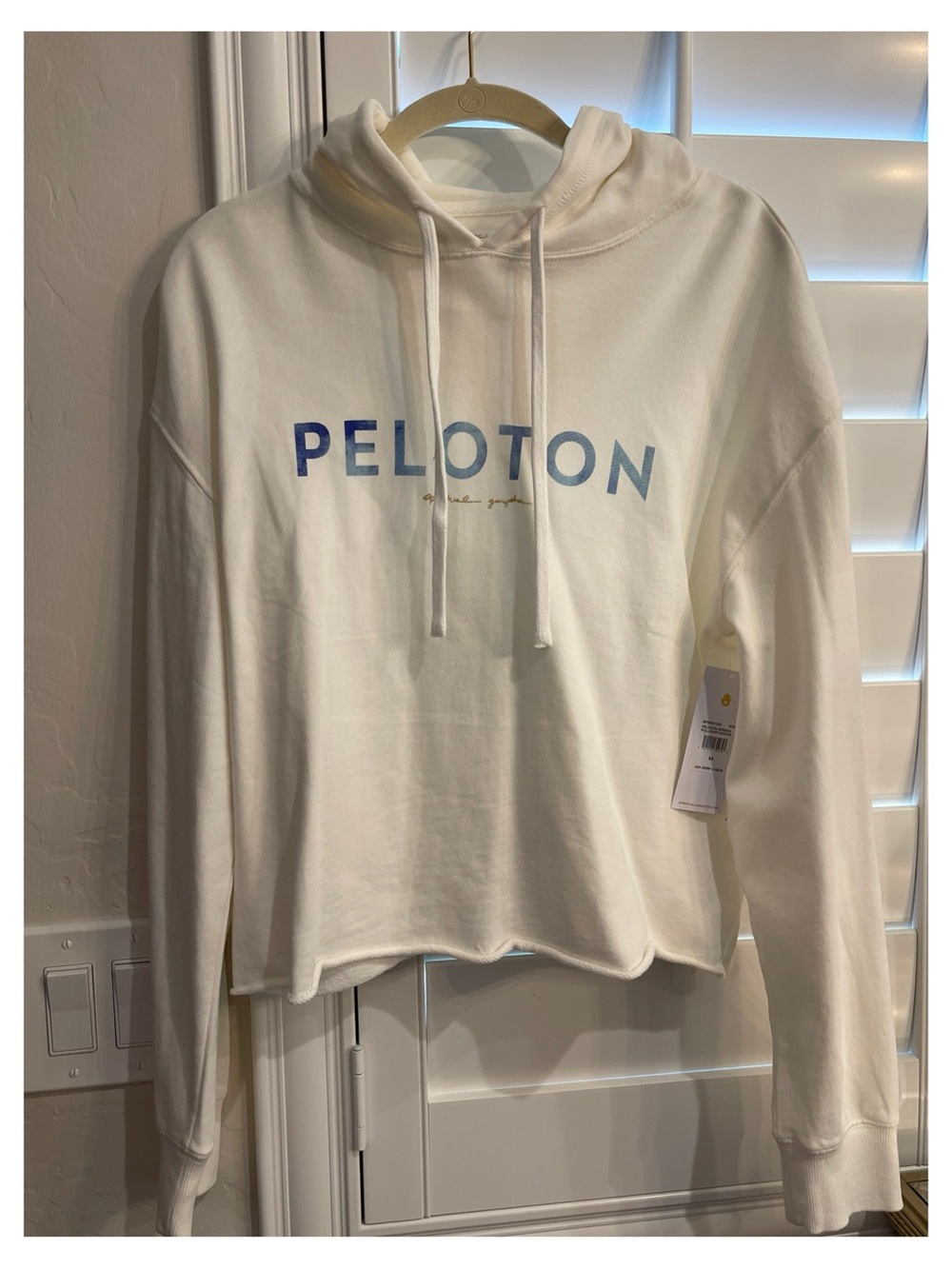 Peloton Cream Crewneck Hoodie with Blue Logo